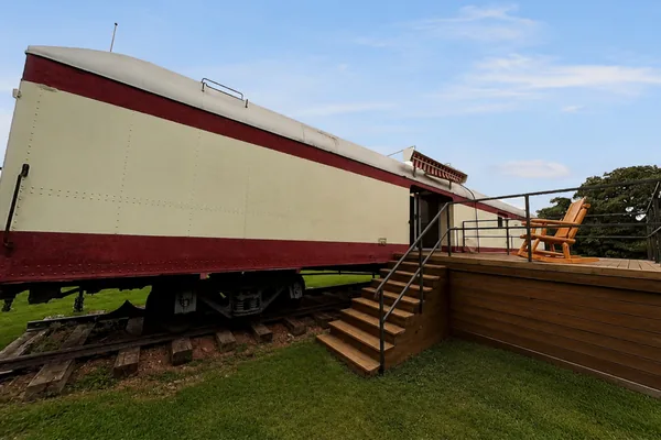The railcar cabin on its track