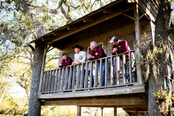 The groomsmen in the saloon