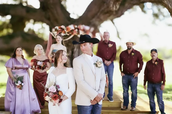 The wedding party on the grounds